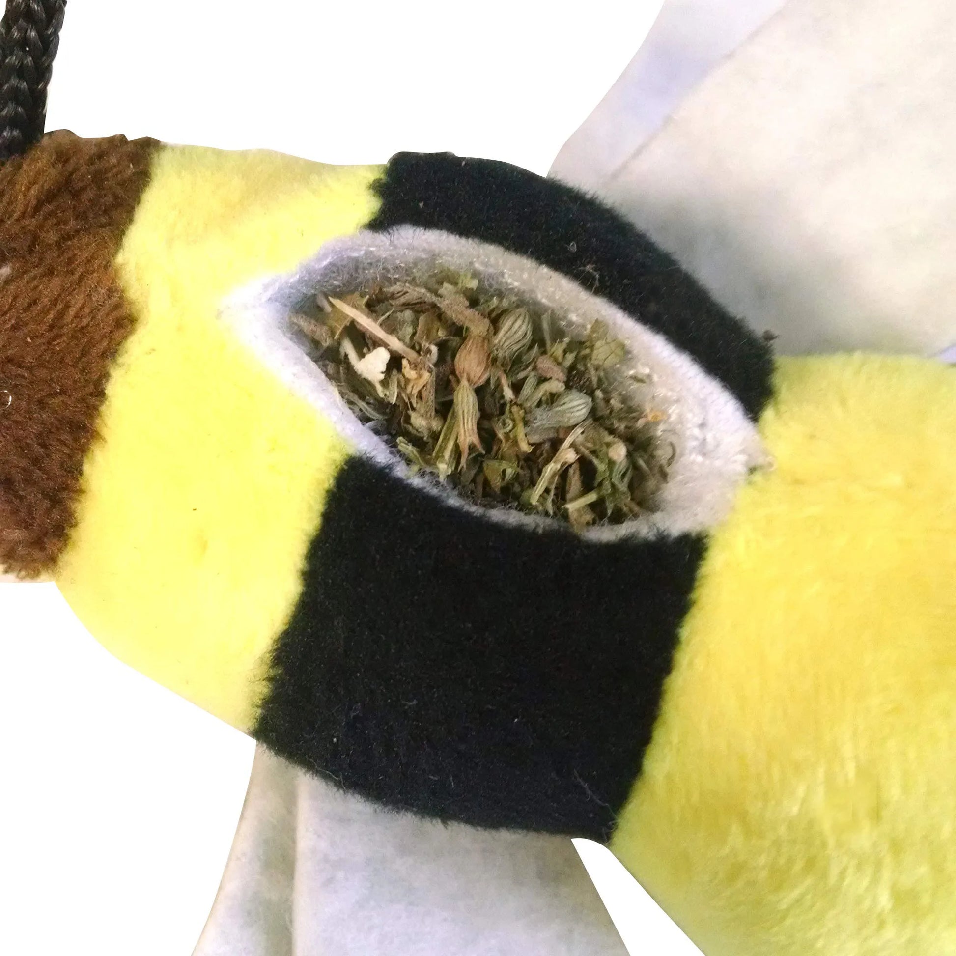 The Meowijuana bee toy with an open pocket showing the refillable catnip inside.