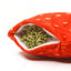 Open strawberry toy showing fresh catnip inside its refillable pocket, ready to stimulate your cat's playful instincts.