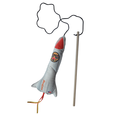 Rocket toy detached from its packaging with attached wand and string, showing its interactive play feature.