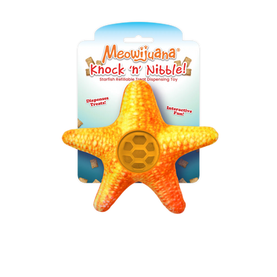 A bright orange starfish-shaped treat dispenser toy for cats, labeled "Meowijuana Knock 'n' Nibble," designed for interactive play.